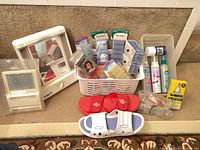 Full lot overview including mirror, sandals, rollers, baskets, hair products