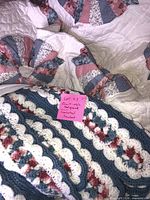 Quilt and crochet throw together showing colors and patterns
