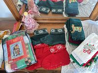Group shot of throw, towels, stockings, angel