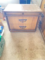 Front view showing full piece and drawer arrangement