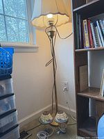 Floor lamp with shade plus two small table lamps at base