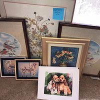 Overall view showing assortment of framed and matted prints
