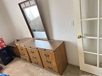 Front view of dresser with mirror attached