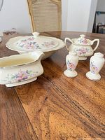 Group shot of all porcelain pieces showing pattern and form