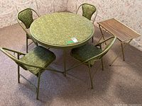 Dinette set overall view showing round table, four chairs, side table