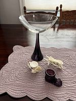All four items displayed upright on mat