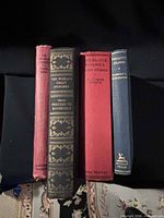 Spines of four hardcover books: The Ontario Reader, World's Great Speeches, Sherlock Holmes Short Stories, Treasure Island