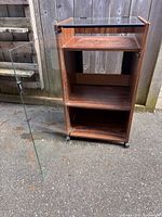 Front angled view with glass door open, cabinet on casters