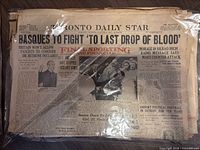 Top section showing Spanish Civil War headline