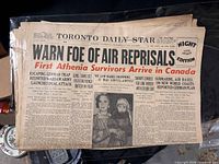 Front page showing masthead, headline, Athenia survivor article and photograph