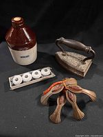 Group shot showing jug, iron, knobs, pulls