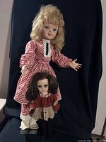 Both dolls standing together for scale and completeness