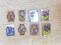 Group shot of all eight Rhamondre Stevenson rookie cards