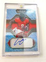 Front of Wild Card Auto Mania Chigoziem Okonkwo autograph card in holder