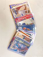 Stack of sleeved basketball cards fanned out