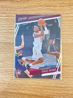 Front view of Isaac Okoro Prestige rookie card in sleeve