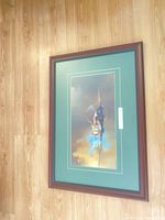 Full view of framed print displaying artwork, mat and frame