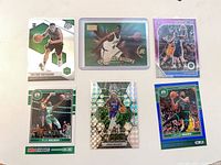 Six cards including Payton Pritchard Mosaic, Chauncey Billups rookie, Jrue Holiday Mosaic refractor, NBA Hoops parallels