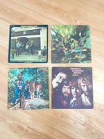 All four Creedence Clearwater Revival album covers