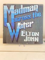 Front gatefold cover of Elton John Madman Across the Water LP