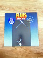 Front cover of Elvis Presley Moody Blue LP with limited edition sticker