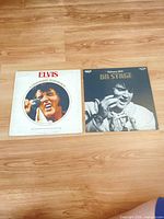 Front covers of both Elvis Presley LPs