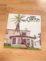 Front cover with title and palm tree artwork