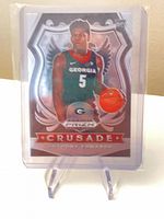 Anthony Edwards Prizm Crusade rookie card in sleeve and stand