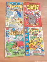 All four comic books laid out together