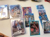 Group of sleeved Mosaic cards featuring Ja Morant and Desmond Bane among others