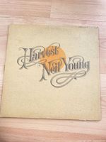 Front gatefold cover with title artwork and writing