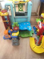 Our Generation food truck with VTech track pieces surrounding it