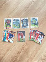 Overview of all cards laid out on wooden surface