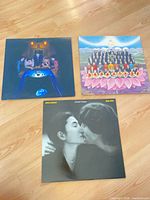 All three LP covers laid out on floor