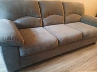Front view showing full sofa, cushions, arms and upholstery