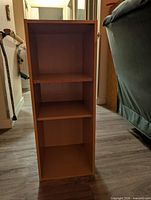 Front view of bookshelf showing three shelf spaces