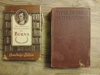 Front view of both hardcover books and slipcase