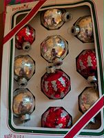 Box showing 10 Pyramid octagonal glass ornaments, red and silver with glitter trees