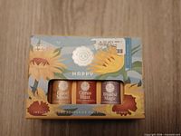 Front of Woolzies Happy essential oil set showing three 10 ml bottles