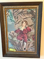 Full view of framed petit point artwork