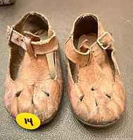 Both shoes top view showing perforated toes and strap layout