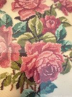 Close-up of petit point rose motif