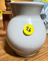 Front view of beige crackle glaze vase
