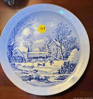 Front view of plate showing full winter farm scene and inscription
