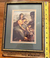 Framed print with ruler and frame detail