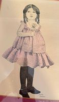 Full view of drawing of young girl