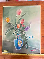 Full view of framed silk batik floral still life painting