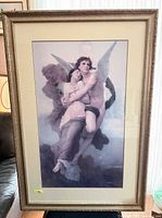 Front view of framed print with mat and frame visible