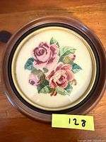 Front view of framed petit point needlepoint roses