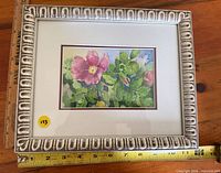 Full view of framed watercolor with measuring tape showing scale